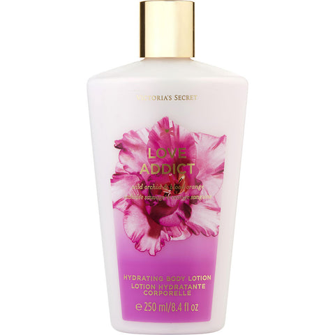 VICTORIA'S SECRET by Victoria's Secret LOVE ADDICT BODY LOTION 8.4 OZ